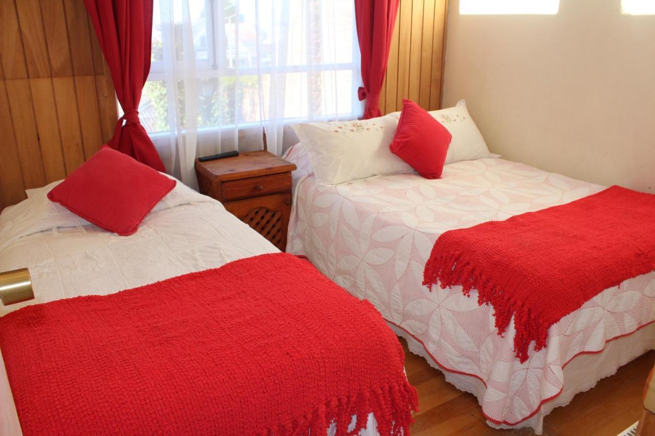 Hostal Y Cabanas Ainil Punta Arenas Exterior photo